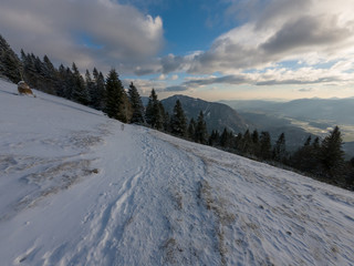 Winter landscape with first snow freshly fallen just covering the scene.