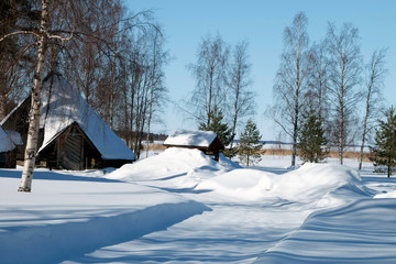 small house in winter forest