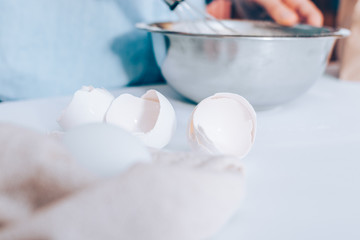Fototapeta na wymiar Close-up empty egg shells on white table