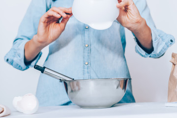Female's hands holding overturned cup