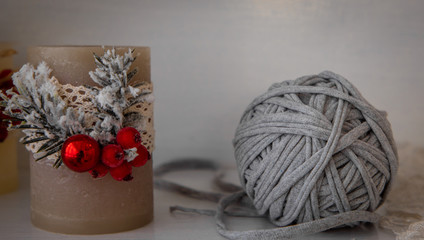 ball of thread and christmas candle