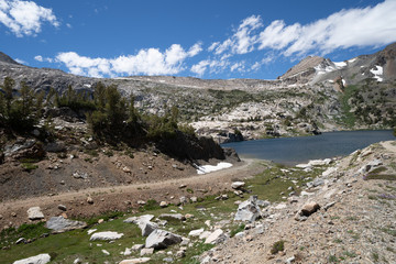 Naklejka na ściany i meble Steelhead Lake in the 20 Lakes Basin area of California, along a hiking trail on a summer day in the Sierra Nevada Mountains