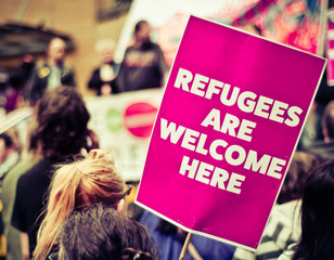 Refugees Are Welcome Street Protestors - obrazy, fototapety, plakaty