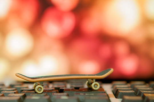 Closeup of Skate on the keyboard on the background bokee