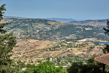 Fototapeta na wymiar Cyprus. Troodos. Monastery of the Virgin Chryssouroyatissa. View from the loggia of the Kannaviu dam