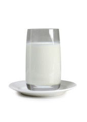 Glass pitcher with milk on white background
