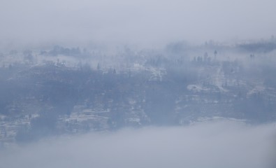 Fototapeta premium Foggy village Bohdan in the Carpathians