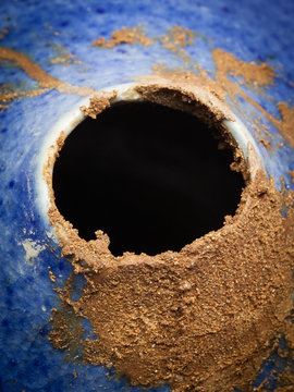 A pot I am repairing with kintsugi with urushi lacquer and jinoko clay.