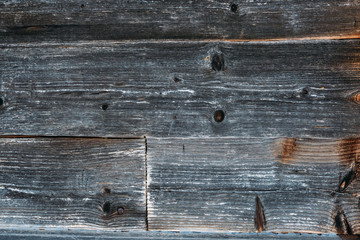 Obraz premium Brown wood wall background texture. Planks of wood damaged by the aging process. Old wooden wall.