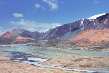 Landscape of a beautiful mountain valley with excessive noise, film grain, compression artifacts...