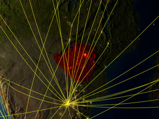Zimbabwe from space on model of planet Earth with networks. Detailed planet surface with city lights.