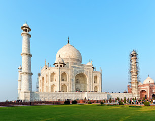 Front view of Taj Mahal in India.Construction of the mausoleum was commissioned in 1632 by the emperor Shah Jahan. In order to preserve the pristine beauty authorities perform renovations regularly.