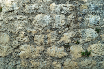 Masonry. Wall of old stones.