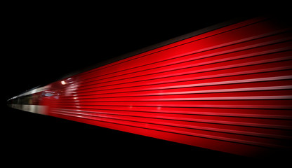 Abstract image of a train departing a European station at night