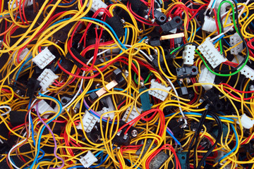 Colorful mess of cables wires and connectors
