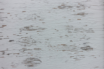 wood panel with white chiping paint with wood grain