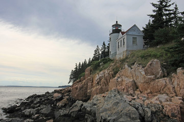 Bass Harbor Head Lighthouse on the rocky coast of Bass Harbor, Maine.