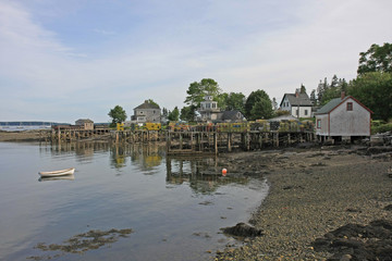 Fototapeta na wymiar Town of Bass Harbor, Maine, and its harbor on a quiet summer afternoon