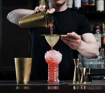 Bartender preparing Tiki Cocktail