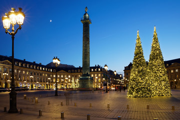 Fototapeta na wymiar Paris, France - December 13, 2018: Place Vendôme with christmas trees in Paris