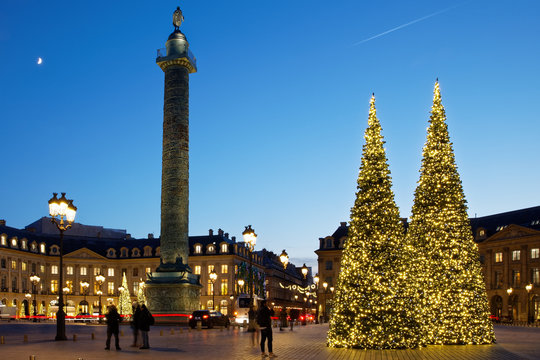 Paris, France - December 13, 2018: Place Vend&ocirc;me with christmas trees in Paris