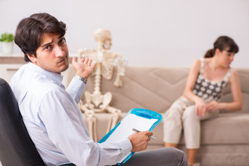 Fototapeta premium Young patient visiting psychologist for therapy