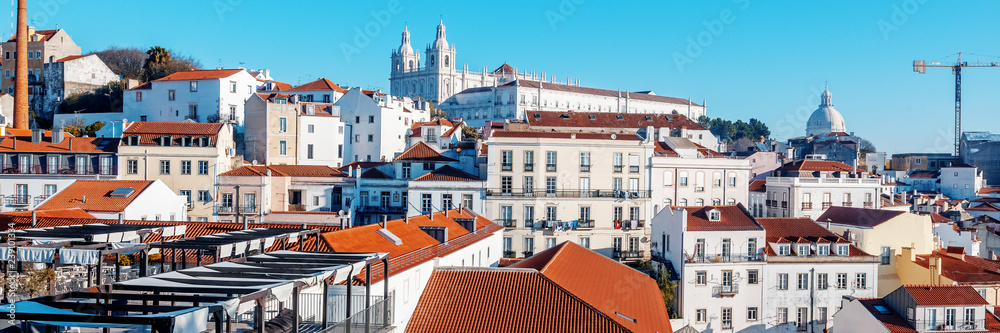 Wall mural lisbon is the capital of portugal, the view of the historical center of the city and the river, a be