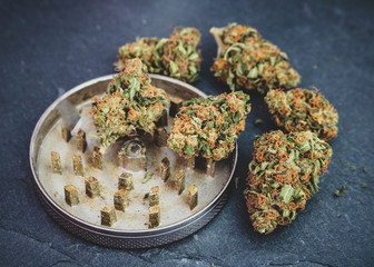 Marijuana flower isolated on steal grinder piece