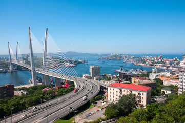Fototapeta na wymiar Russia, Vladivostok, July 2018: View of Golden Bridge over Golden Horn Bay of Vladivostok