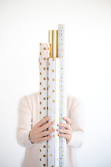 rolls of gift wrappers on white background