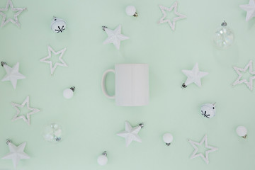 white mug with christmas ornaments