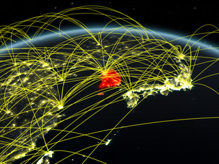 South Korea on planet Earth at night with international network representing communication, travel and connections.