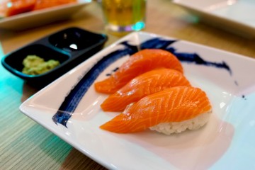 salmon sushi with white plate