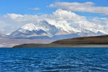 Fototapeten  Holy Rakshas Tal lake and Gurla Mandhata peak in Ngari, Western Tibet, China. This lake also known as Demons Lake, Ravana Tal or Ravan Harda, Langa Tso in Hindu Religion © irinabal18