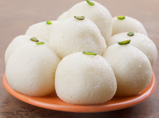 Indian Sweet Rasgulla Also Know as Rosogolla, Roshogolla, Rasagola, Ras Gulla, Anguri Rasgulla or Angoori Rasgulla is a Syrupy Dessert Popular in India. It is Made From Ball Shaped Dumplings