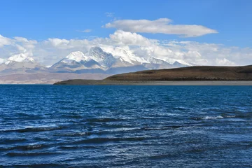 Zelfklevend Fotobehang  Holy Rakshas Tal lake and Gurla Mandhata peak in Ngari, Western Tibet, China. This lake also known as Demons Lake, Ravana Tal or Ravan Harda, Langa Tso in Hindu Religion © irinabal18