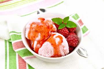 Ice cream crimson with syrup on light board