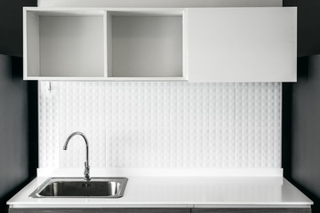 steel sink in modern white kitchen clean interior design