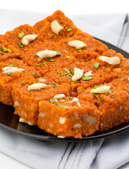Indian Sweet Food Akhrot Halwa Also Called Walnut Burfi or Akhrot Ka Sheera Made From Walnut, Khoya, Milk or Flavour