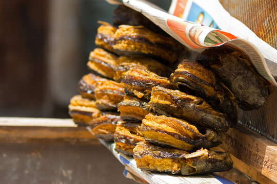 Dried catfish rings on stall for sale at Mto wa Mbu village in Arusha, Tanzania, Africa.