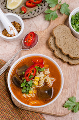 Thick red soup with pasta