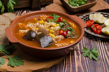 Thick red soup with pasta