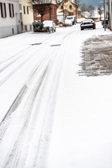 covered with snow, a slippery street in the town
