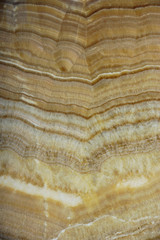 Picture of nature on the slab of a natural stone Onyx, vertical