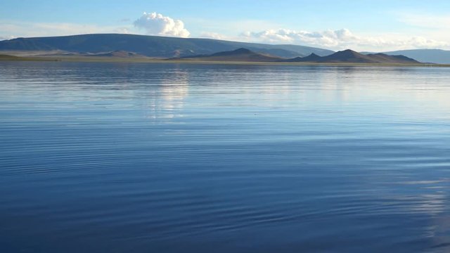 Calm Waters Of Mongolian Lake Telmen Lake Surrounded By Hills. Mongolia.