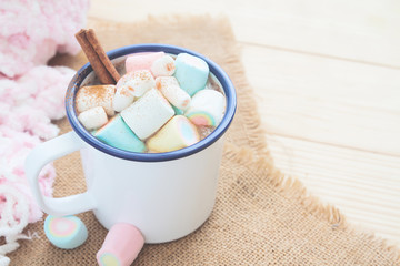 Hot chocolate with pastel colour marshmallow, pastel food and drink. Winter lifestyle