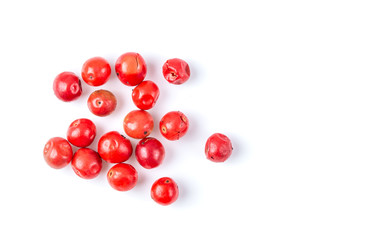 pink peppercorn isolated on white background. top view