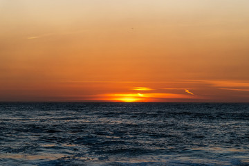 Sunset on Atlantic ocean, Nazare, Portugal.
