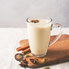 Mug of spice latter tea or coffee, winter and autumn hot drink