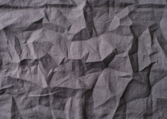 Background and texture grey textile linen cloth, wrikles and crumpled